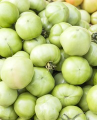 Pickle green tomatoes in a supermarket