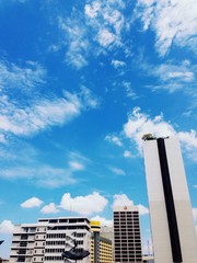 Blue sky above buildings