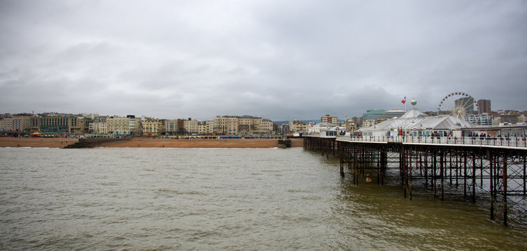 Brighton Pier Under Cloudy Skies