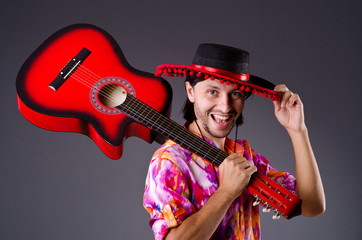 Man wearing sombrero with guitar