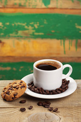 Coffee cup and tasty cookies