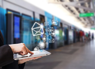 Businesswoman sending email
