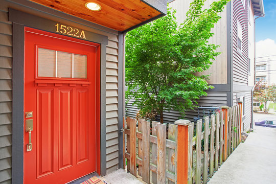 Entrance porch with bright red door
