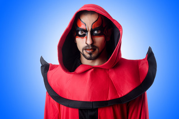 Man devil in red costume