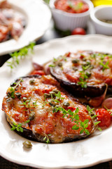 Grilled eggplant stuffed tomatoes, cheese and herbs