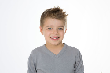 blond cheerful kid on isolated background