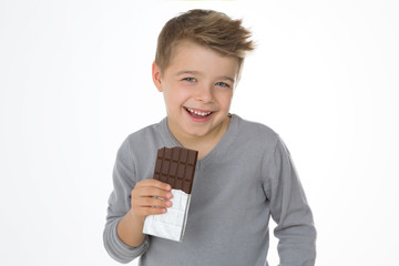 child enjoying his favourite sweet