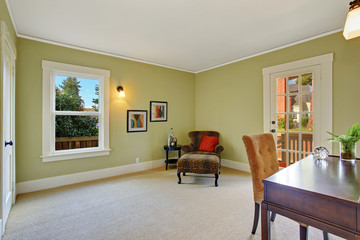 Office room with leopard chair in the corner