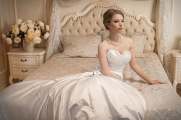 Fototapeta na wymiar Beautiful bride in white dress