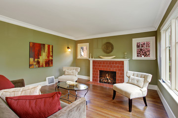Olive tone family room with fireplace