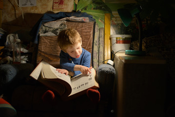 Fototapeta na wymiar Child Reading a Book