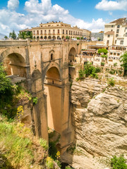 view of buildings over cliff in ronda, spain - obrazy, fototapety, plakaty