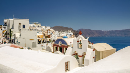 Naklejka premium view of oia in santorini and part of caldera