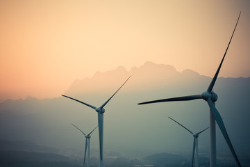 wind power generation turbine closeup at dusk