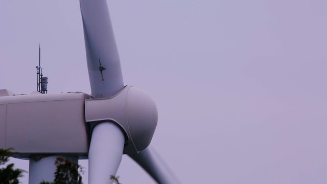 Profile shot of a white windmill