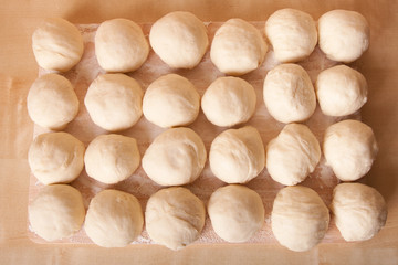 Small balls of dough with flour for pizza or cakes and scones. S