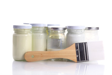 brush and bottle glass of color for painting art