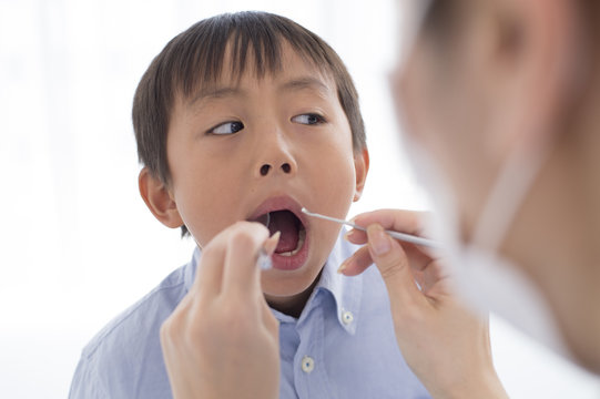 Boy undergoing dental checkup