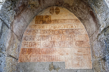 medieval latin inscription outside italian church