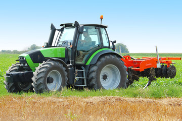 Obraz premium Tractor on the field