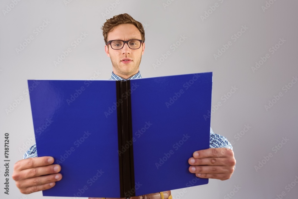 Poster geeky student reading a book