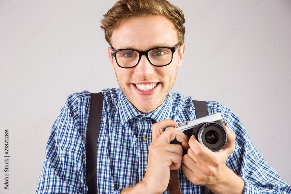 Aufkleber geeky hipster holding a retro camera