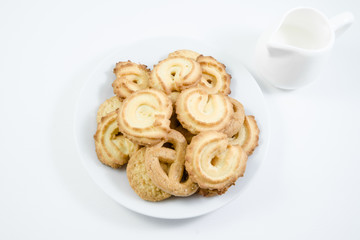 Obraz na płótnie Canvas Danish Butter Cookies served with milk isolated