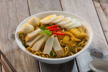 Instant noodles soup, in curry flavour. Hot and spicy.