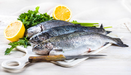 River trout with fresh tomatoes, lemon and herbs
