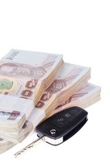 Car key and banknotes,Isolated on white background