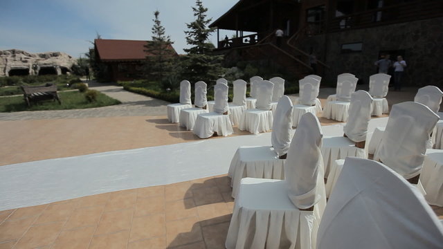 Decorating of wedding ceremony outdoors in the restaurant