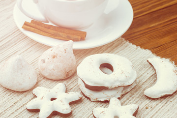 french meringue sweets and coffee cup