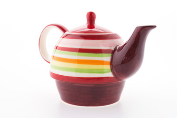 Colorful tea pot isolated on white background