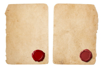 Old parchment letter set with red wax seal