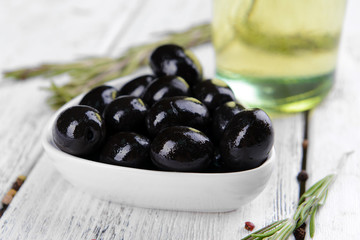 Marinated olives on table close-up