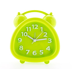 Green alarm clock isolated on white background