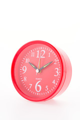 Red clock isolated on white background