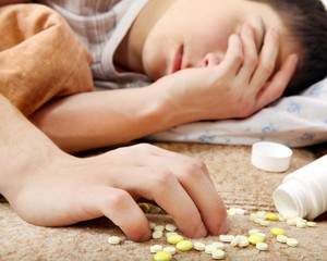 Obraz na płótnie Canvas Teenager near the Pills