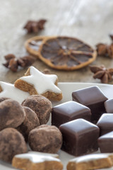 Pralines of Chocolate and marzipan and cinnamon stars
