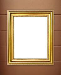 blank golden frame on cement wall background