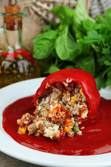Prepared stuffed pepper with tomato sauce