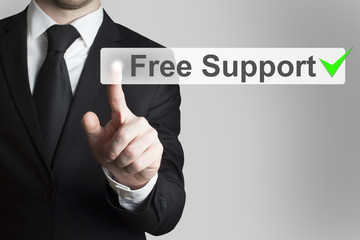 businessman pushing flat button free support