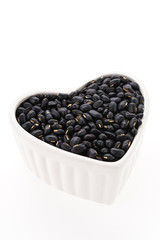 Black beans isolated on white background