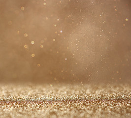 glitter vintage lights background. abstract gold background . de