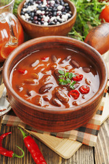 Chili soup with red beans and greens