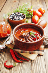 Chili soup with red beans and greens