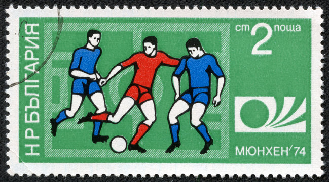 Stamp printed in BULGARIA shows a football players