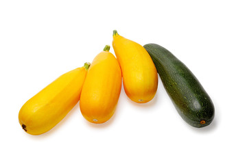 Yellow and green vegetable marrows isolated on a white backgroun