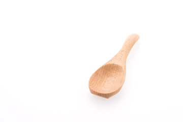 Wooden spoon isolated on white background