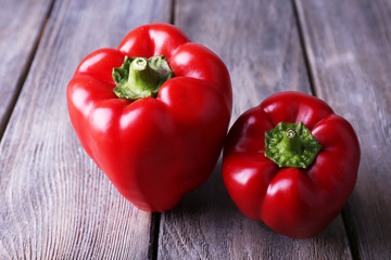 Red pepper on wooden background